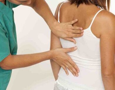A patient complaining of shoulder blade pain on both sides during a doctor's appointment